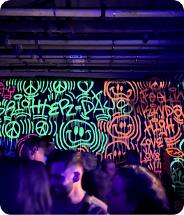 A neon wall piece in a club