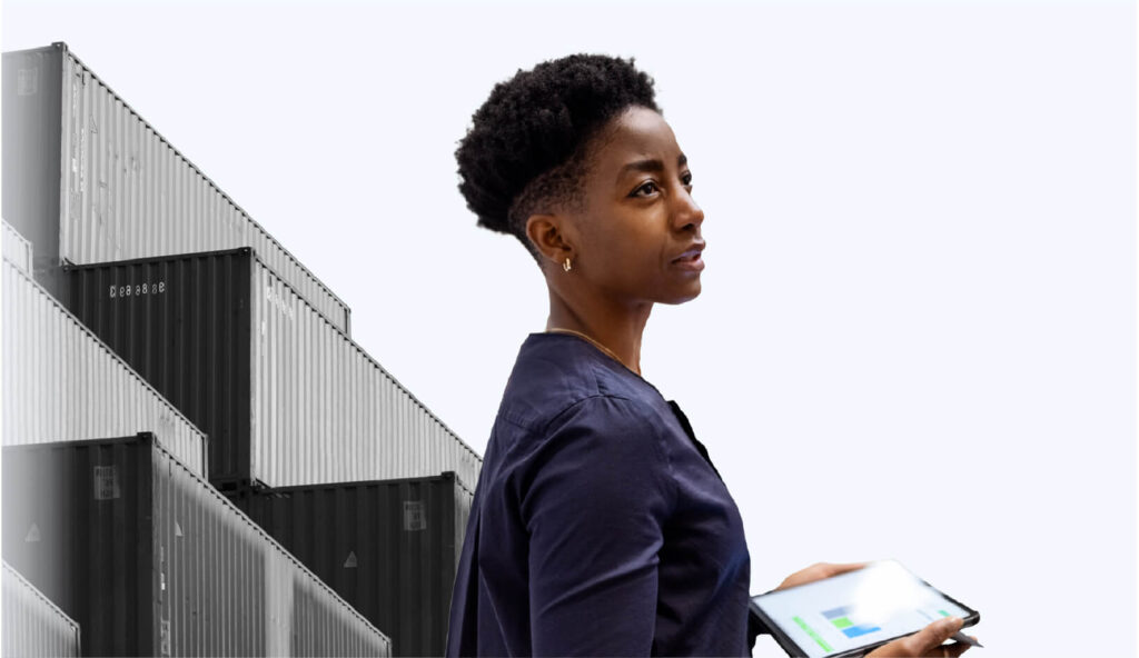 Brand imagery style example featuring a Woman holding an Ipad, with a stack of containers in the background